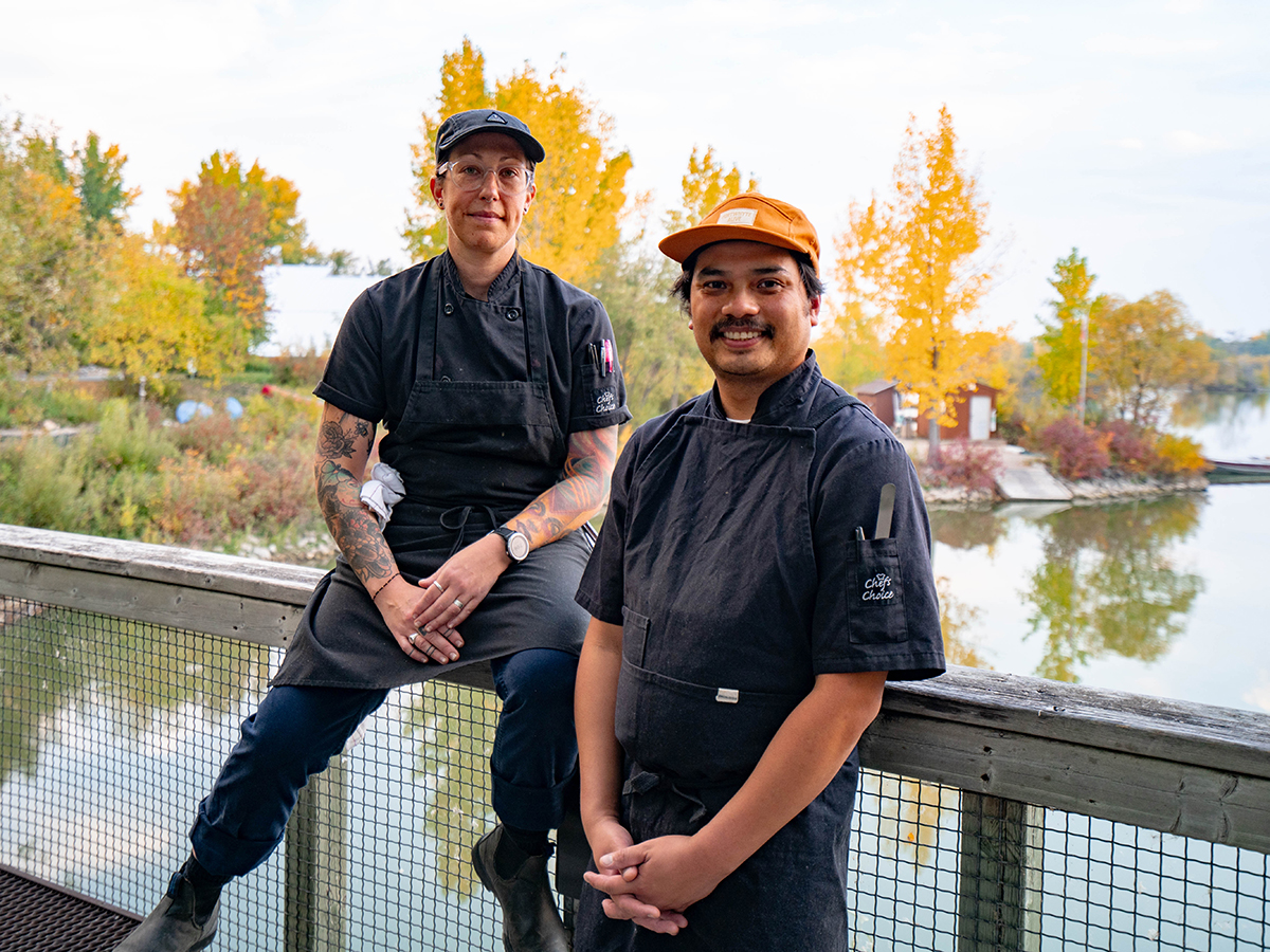 Adventurous outdoor dining in Winnipeg, from season to season  - Executive chef of Diversity Food Services Jess Young and Chef Darwin Gaspar at FortWhyte Alive (photo Abby Matheson)