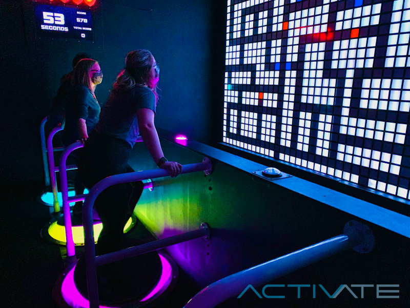 In Control, you'll tilt on a standing joystick to move on the giant screen ahead.